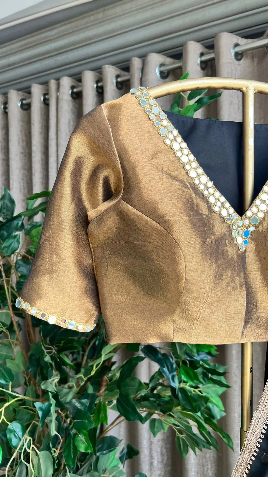 Black organza saree with copper mirror worked blouse