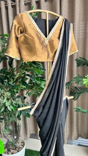 Black organza saree with copper mirror worked blouse