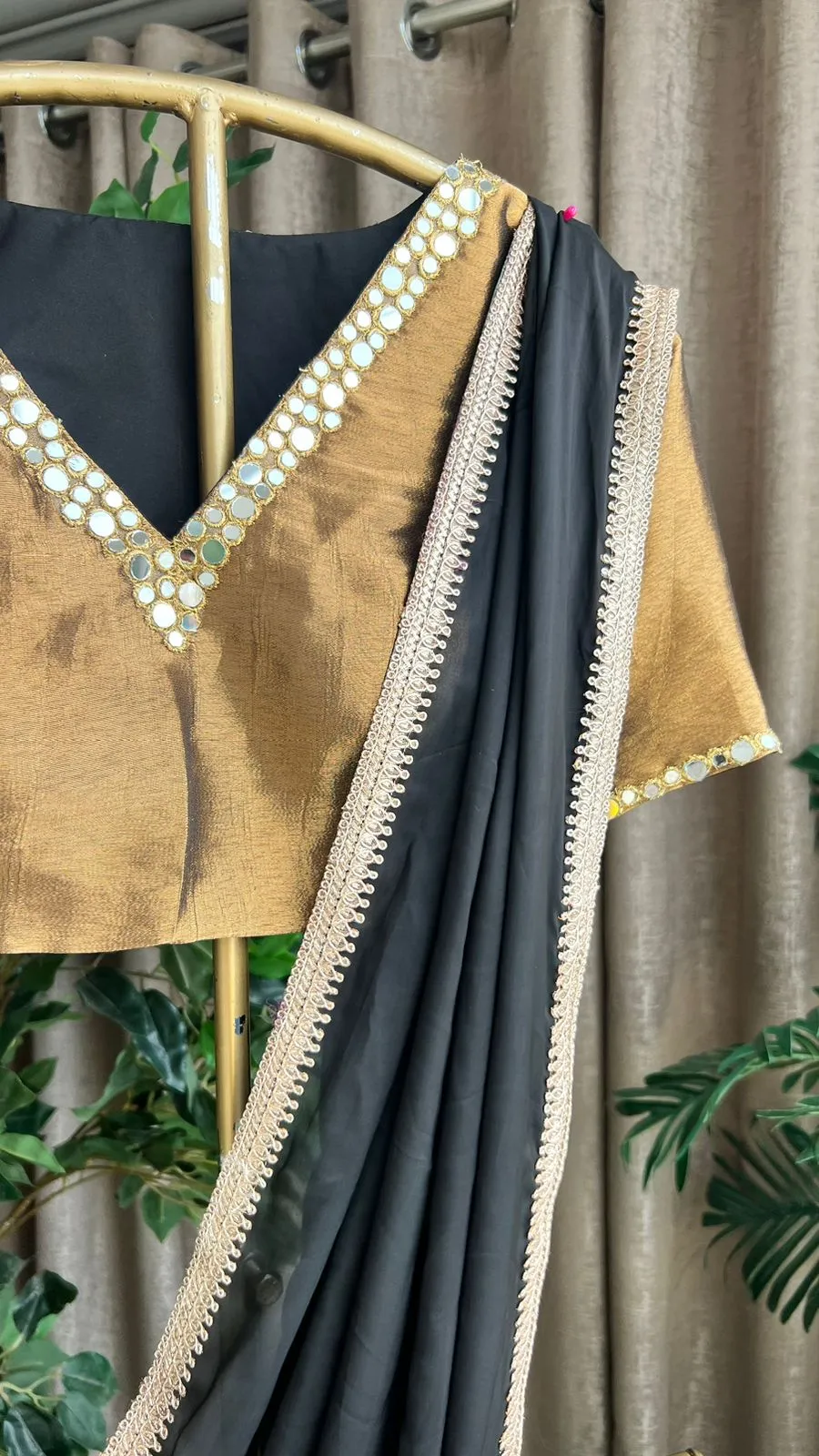Black organza saree with copper mirror worked blouse
