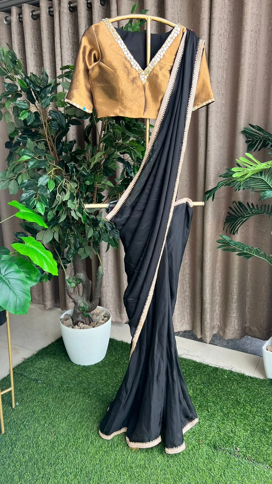 Black organza saree with copper mirror worked blouse