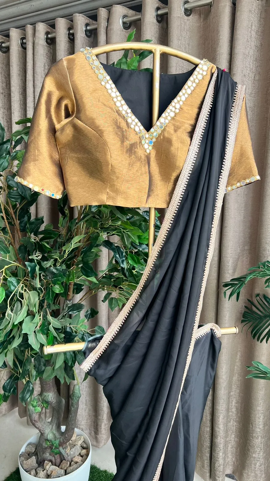 Black organza saree with copper mirror worked blouse